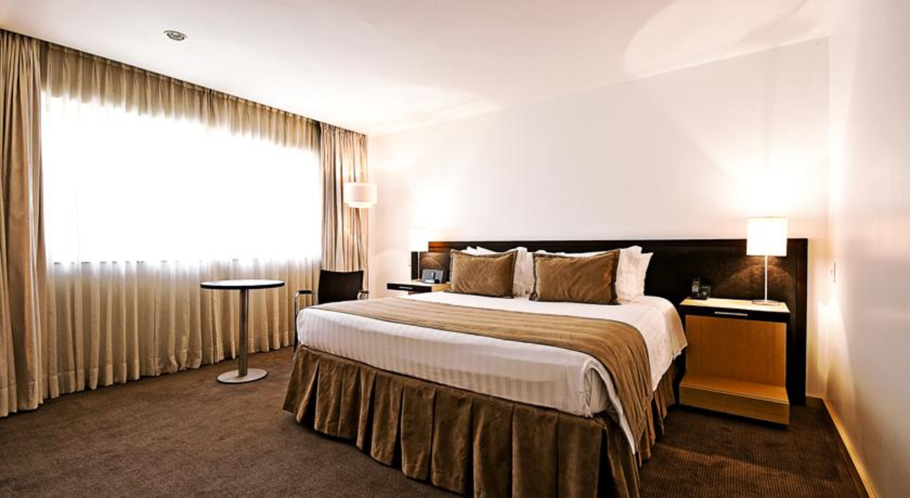 Movich Hotel Las Lomas Rionegro Exterior photo A bedroom at the hotel